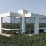 Hospital de Amor em Barretos com campos de soja ao fundo simbolizando doações do agronegócio