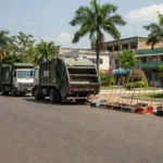 Ruas de Porto Velho com equipamentos de limpeza urbana para garis